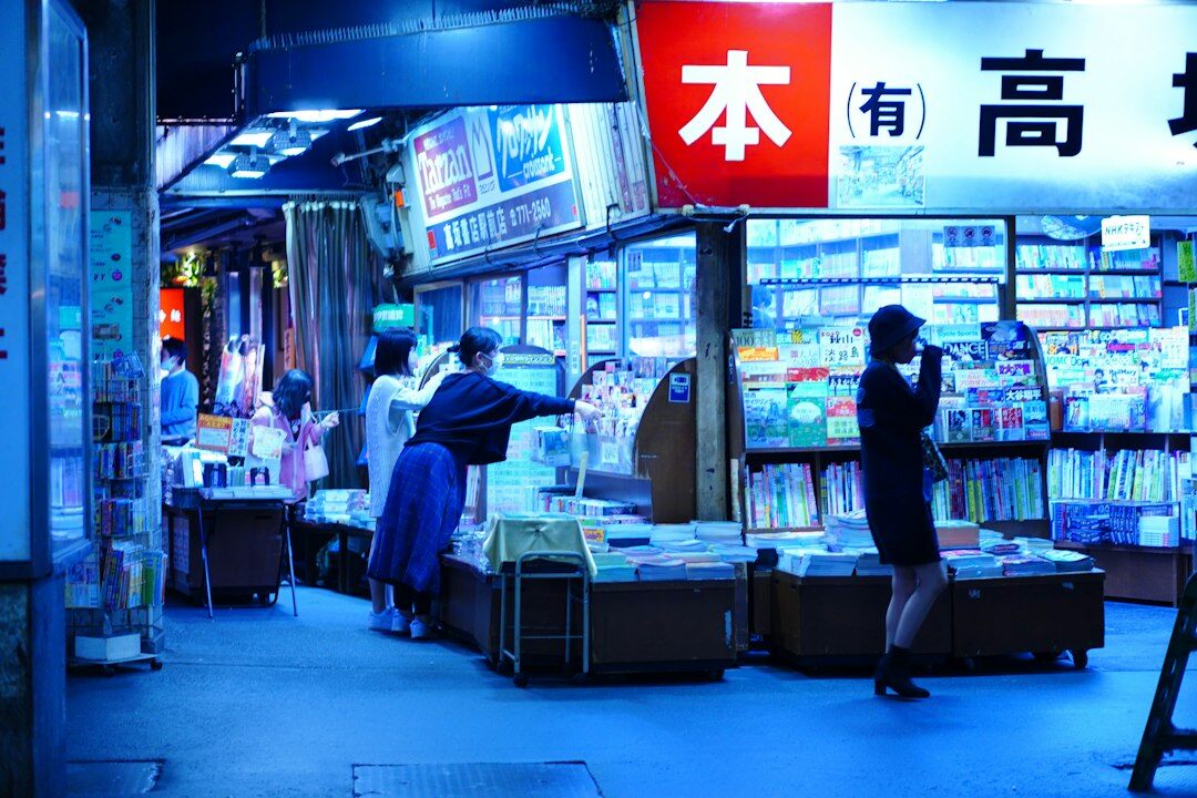 person reading book at night