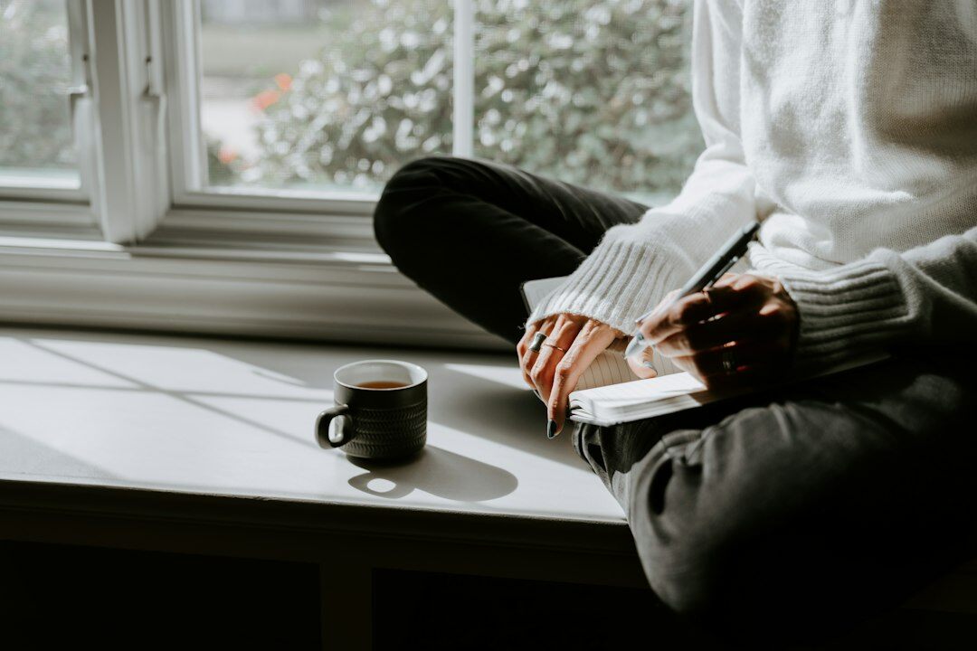 author writing by window
